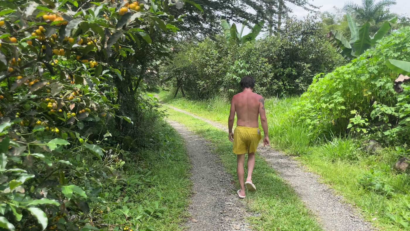 A participant walking along a path at the Suma Kallay homestead.
